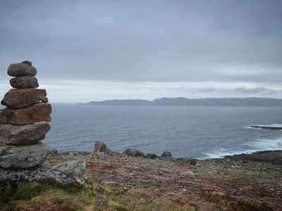 Balanced stones in a minimalist arctic environment